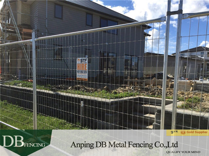 Galvanised temporary fencing installed around the house site in Auckland